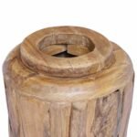 écorce du teck affleurant sur le flanc du vase