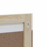 miroir fixé au mur au-dessus d'un lavabo